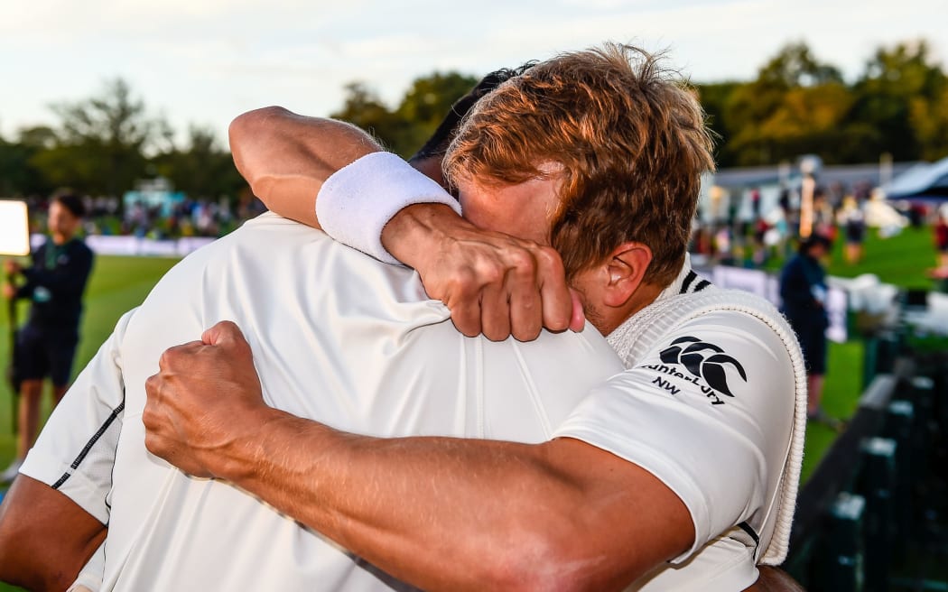 Ish Sodhi and Neil Wagner hug after holding out against England.
