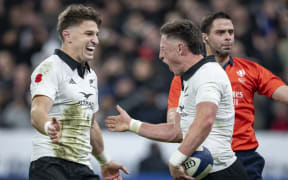 Cam Roigard celebrates with Beauden Barrett.