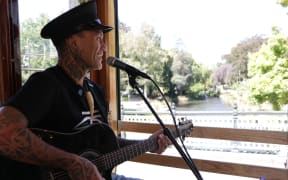 Tiki Taane gave a lunchtime performance on a tram in Christchurch on 20 February 2024.