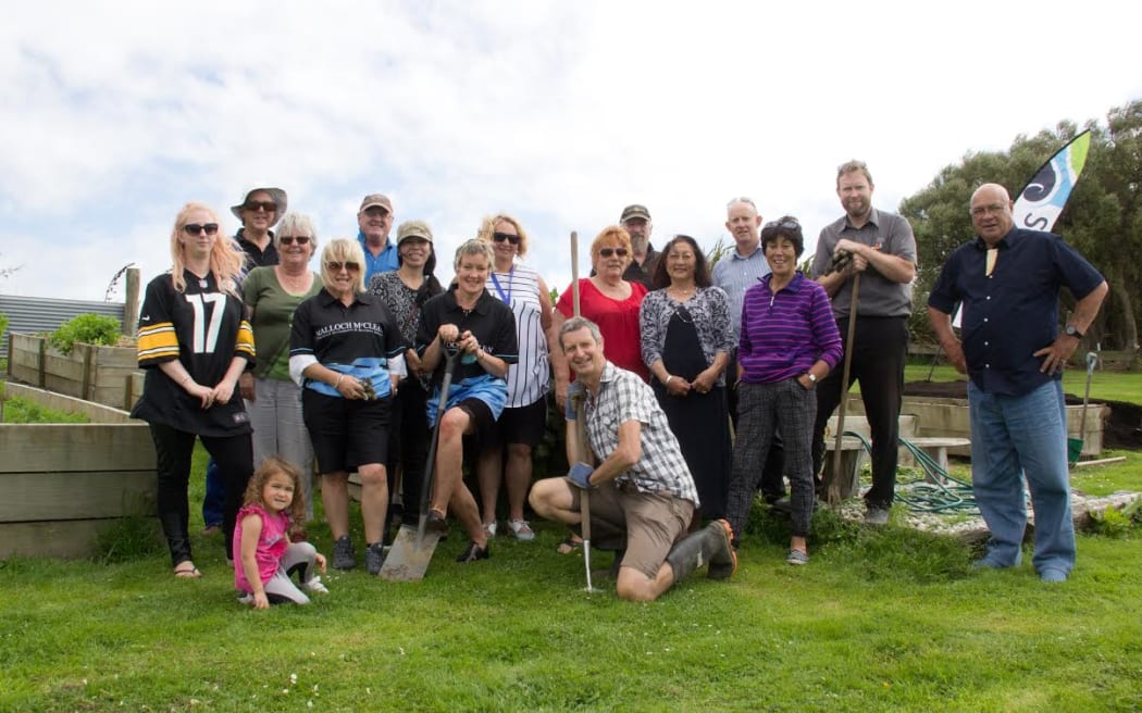 Gerry Forde, founder of the Spirit Army in Invercargill, in the centre kneeling.