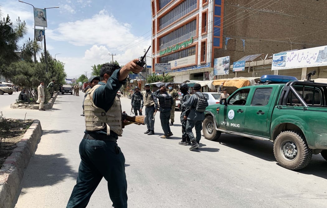 Afghan security forces inspect the scene after gunmen attack to Medicins Sans Frontieres (MSF) clinic.