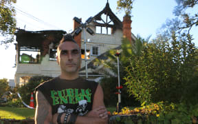 Benjamin Rees outside Parnell's City Garden Lodge, which was gutted by fire on 7 April, 2024. Rees said he had been provided accommodation at the lodge by WINZ after being homeless for a month.
