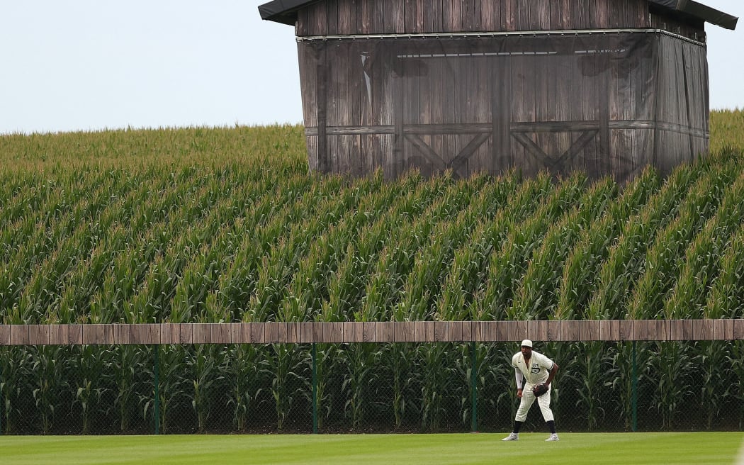 Eloy Jimenez #74 of the Chicago White Sox anticipates a pitch during the third inning against the New York Yankees at the Field of Dreams on August 12, 2021 in Dyersville, Iowa.