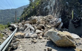 Rocks blocking part of the road on a section of a highway in Taichung, after a major earthquake hit Taiwan's east on 3 April, 2024.