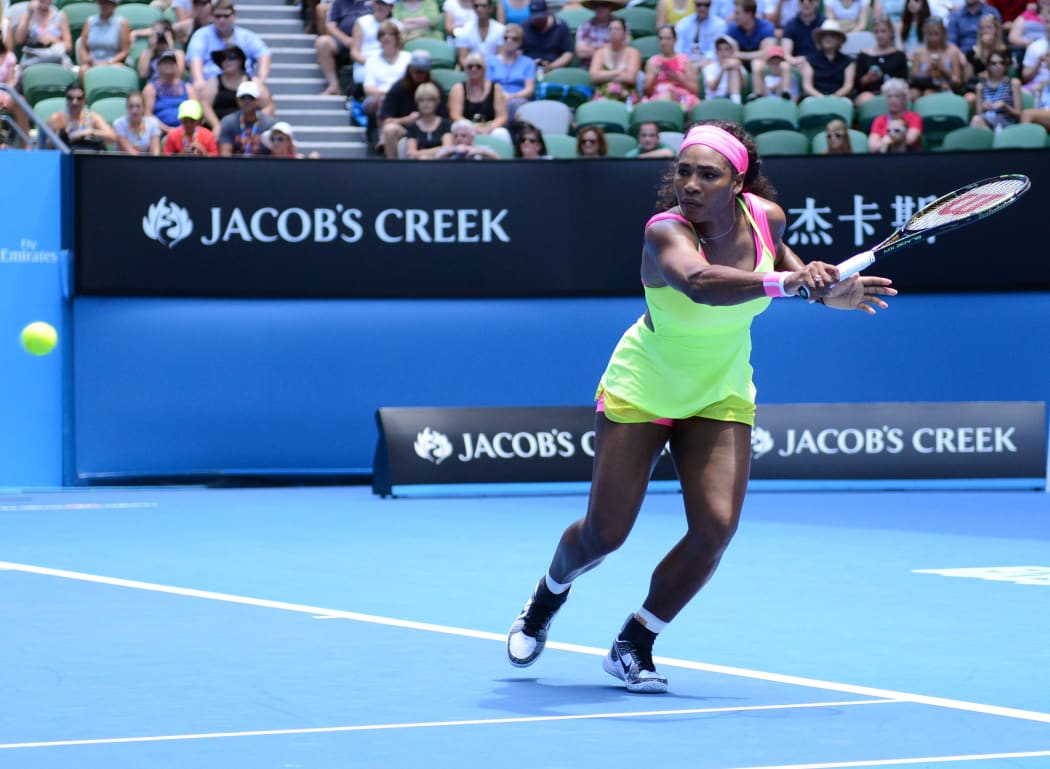 Serena Williams returns a shot against Vera Zvonareva during their second round match at the Australian Open.