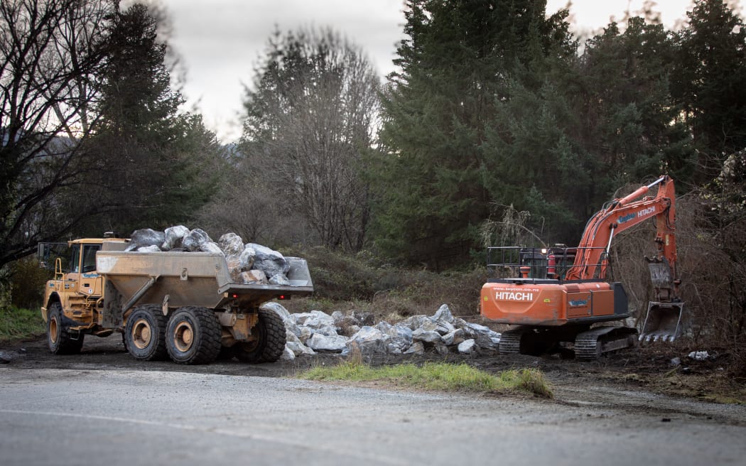 Crews are cleaning up and preparing for more rain near State Highway 6 near Kohatu.