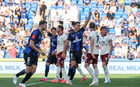 Auckland FC's Logan Rogerson celebrates his goal.
