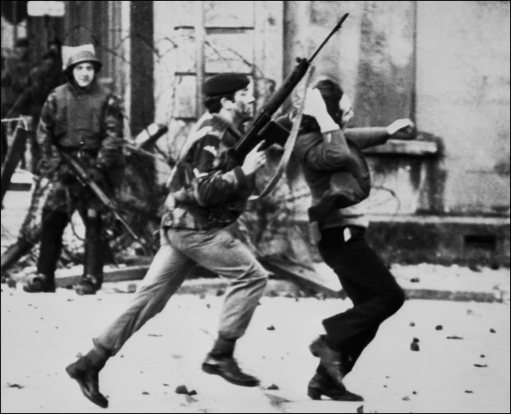 In this file photo taken on January 30, 1972, a British soldier is pictured draging a Catholic protester during the "Bloody Sunday" killings.