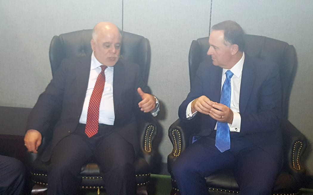 Iraqi prime minister Haider al-Abadi, left, meeting John Key.