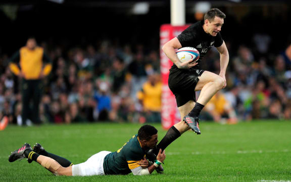 All Black Ben Smith breaks free of Juan de Jongh in record win.