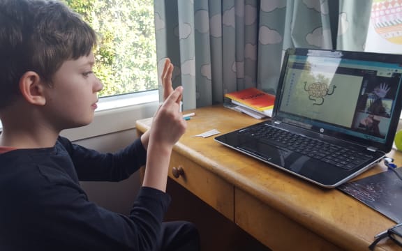 Oskar Graham-Smith connects up with his class from Rawhiti School in Christchurch this morning for learning at home during the Covid-19 lockdown.