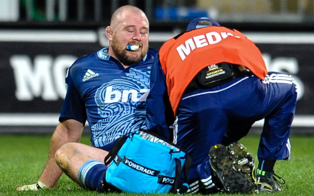Tony Woodcock of the Blues gets some medical attention during their Super rugby match vs the Crusaders in Christchurch in July.