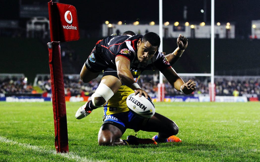David Fusitua of the Warriors scores a try against the Eels at Mt Smart Stadium.