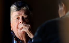 elderly woman in conversation