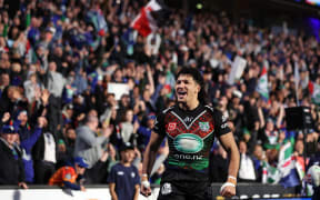 Dallin Watene-Zelezniak of the Warriors celebrates a try during the NRL Premiership match Warriors v Sharks at Go Media Mount Smart Stadium.