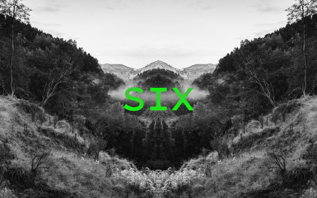 Podcast episode image for the 'Mr Lyttle Meets Mr Big' podcast. A moody black and white photograph of a misty country valley is mirrored vertically creating a Rorschach like effect with the episode number 'SIX' overlaid in vibrant green.