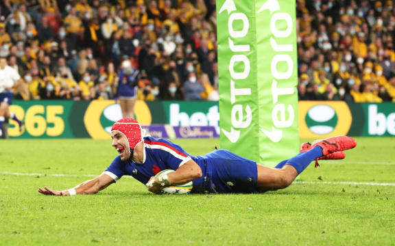 France's Gabin Villiere scores a try