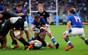 All Blacks hooker Dane Coles scores against Italy in Rome.