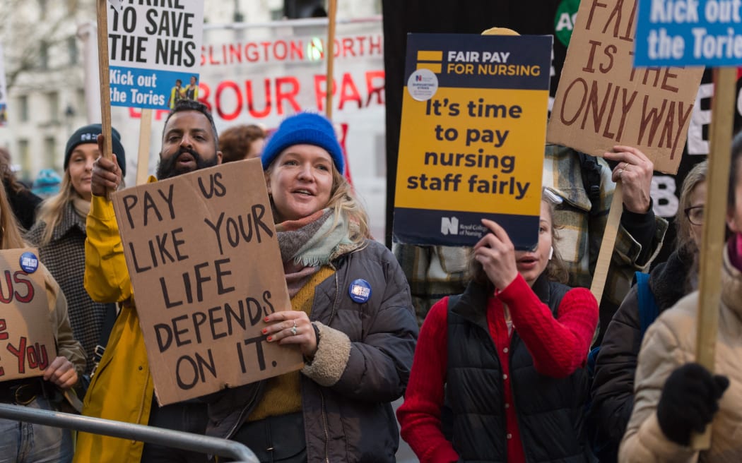Nurses and their supporters gather outside Downing Street after marching from University College London Hospital through central London on the second day of strike action over pay and patient safety called by the Royal College of Nursing in London, United Kingdom on December 20, 2022. Up to 100,000 nurses across 70 trusts and health organisations in England, Wales and Northern Ireland are taking part in the industrial action calling for a 19% pay rise to overcome years of real-terms pay cuts and to protect patient safety by allowing the NHS to recruit and retain nurses amid critical shortage of staff.