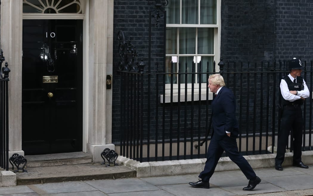 Former mayor of London Boris Johnson walks to 10 Downing Street in central London on July 13, 2016 after New British Prime Minister Theresa May takes office following the formal resignation of David Cameron.