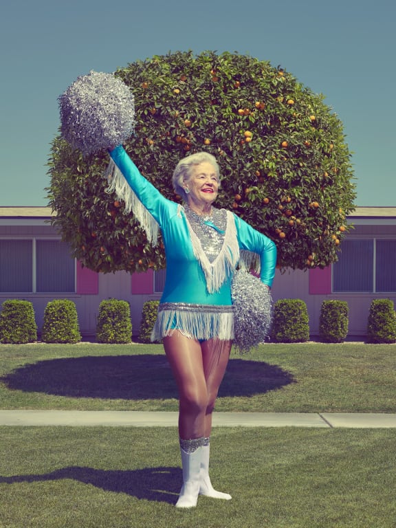 A member of the veteran cheerleading team the Sun City Pom's.