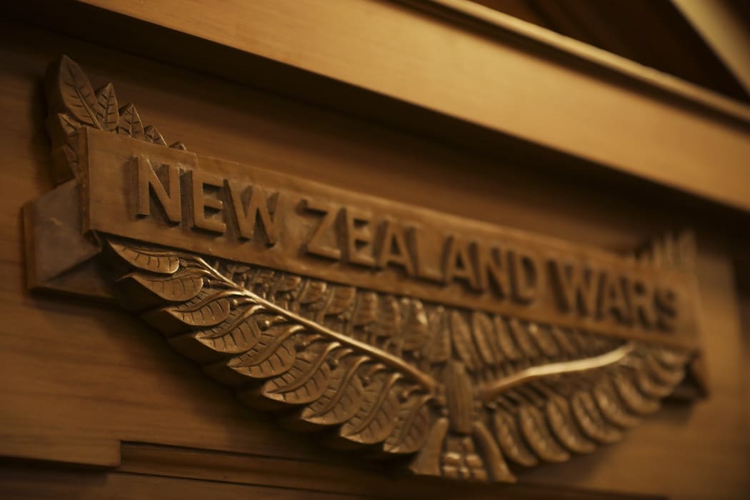 A plaque unveiled in Parliament, commemorating the New Zealand Wars.