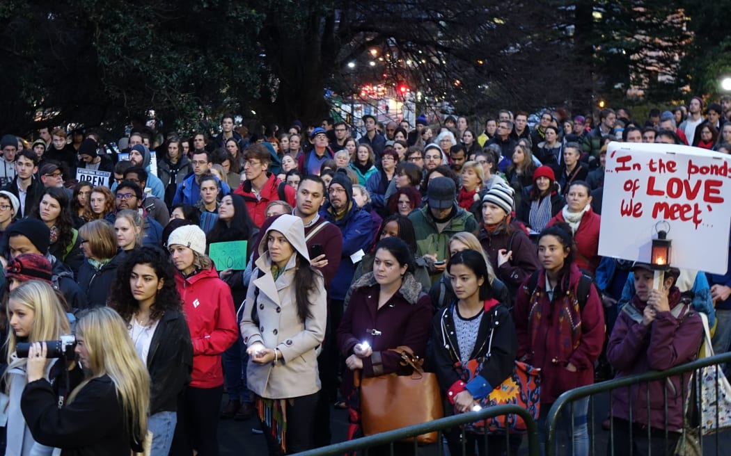 A vigil at Parliament calling for New Zealand to double its refugee quota.