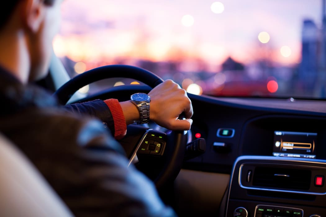 man in car