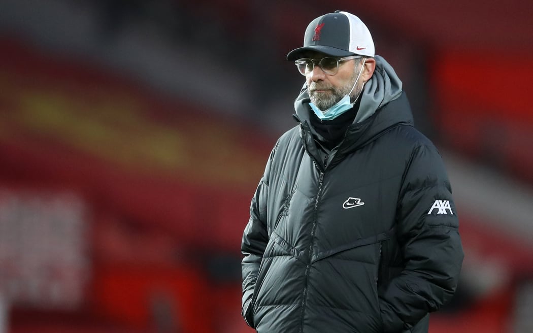 Liverpool's German manager Jurgen Klopp looks on ahead of the English FA Cup fourth round football match between Manchester United and Liverpool at Old Trafford in Manchester on January 24, 2021.