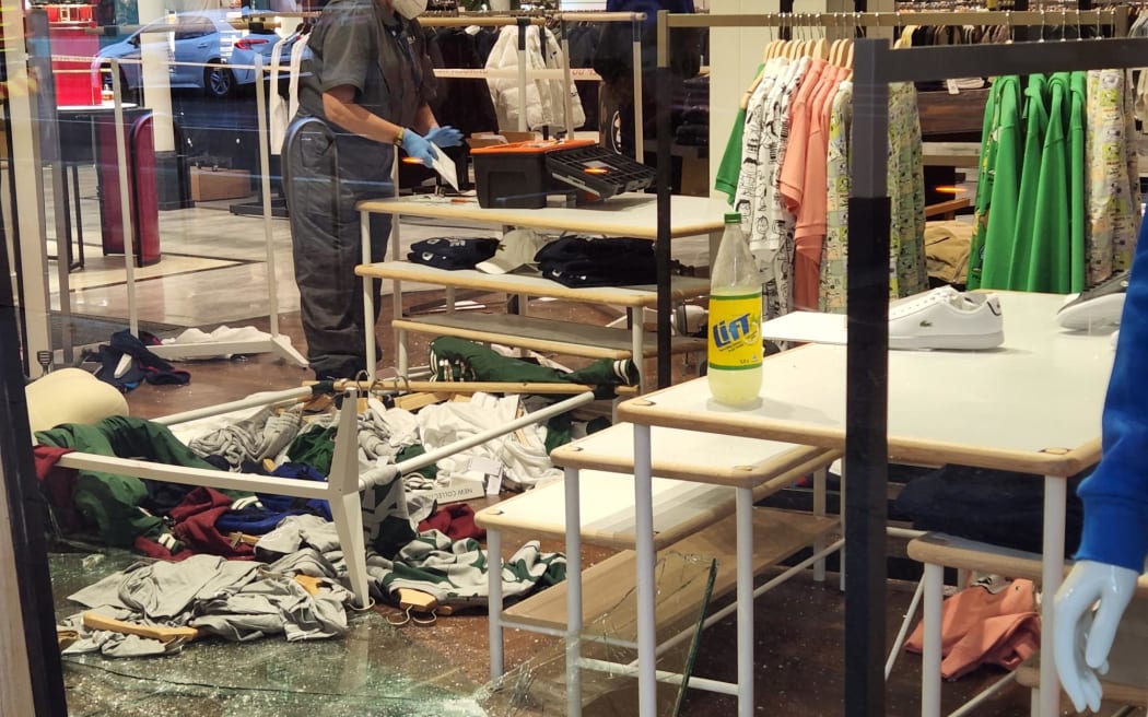 Investigators at Smith and Caughey's department store on Auckland's Queen's Street which was targeted by ram raiders on 12 June.