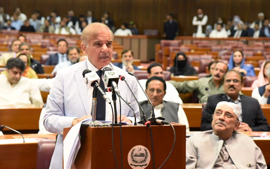 This handout photo shows Pakistan's newly elected Prime Minister Shehbaz Sharif addressing the National Assembly in Islamabad 11 April 2022.