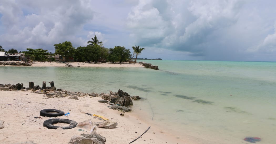 The seawall broke and created a channel. To the left where there was once houses, there is now a body of water