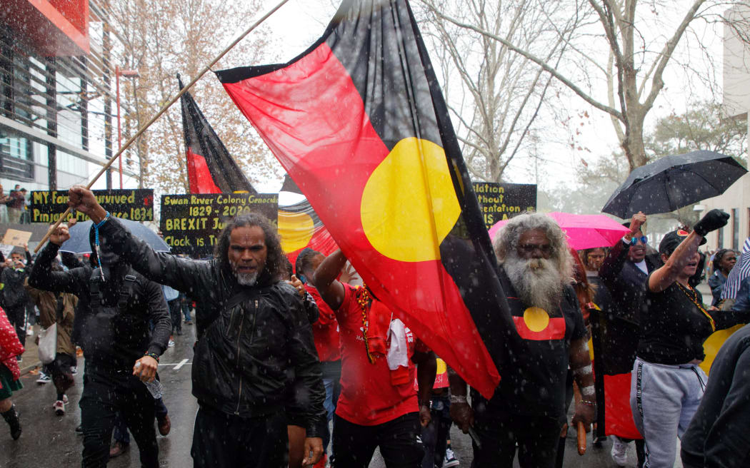 Demonstrators march through Perth in June 2020, during a Black Lives Matter protest to express solidarity with US protesters and demand an end to Aboriginal deaths in custody.