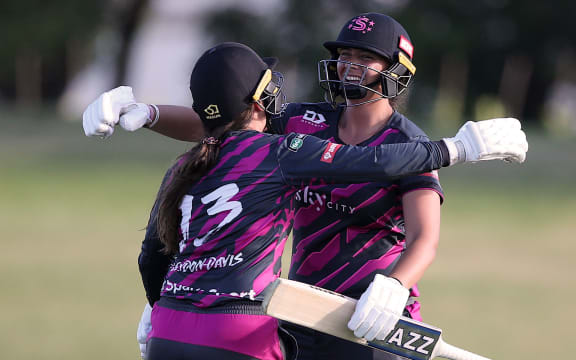 Northern Spirit's Meddy Hyde, right and Felicity Leydon-Davis celebrate victory.