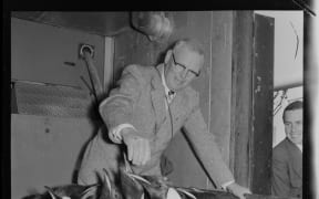 A crate of penguins onboard the USS Edisto, 1956.