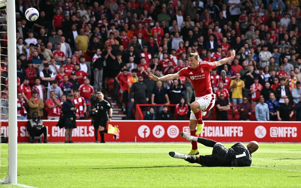 Nottingham Forest's New Zealand striker Chris Wood watches his shot go over the bar during the English Premier League football match against Chelsea at The City Ground in Nottingham, 25 May, 2025.
