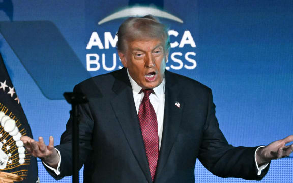 US President Donald Trump arrives to speak at the American Business Forum at the Kaseya Center in Miami on November 5, 2025. (Photo by Chandan Khanna / AFP)