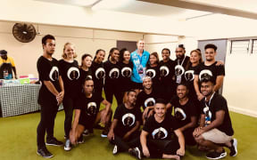 The Mata hip-hop dance crew with Fiji rugby official Demelza Fellowes during a function hosted by the FRU in Suva.