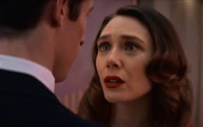 Callum Turner as Luke and Elizabeth Olsen as Joan in the 2025 film, Eternity, directed by David Freyne.