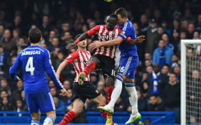 Chelsea's English defender John Terry (R) vies with Southampton's Senegalese midfielder Sadio Mane (2nd R) during the English Premier League football match between Chelsea and Southampton at Stamford Bridge in London on March 15, 2015.