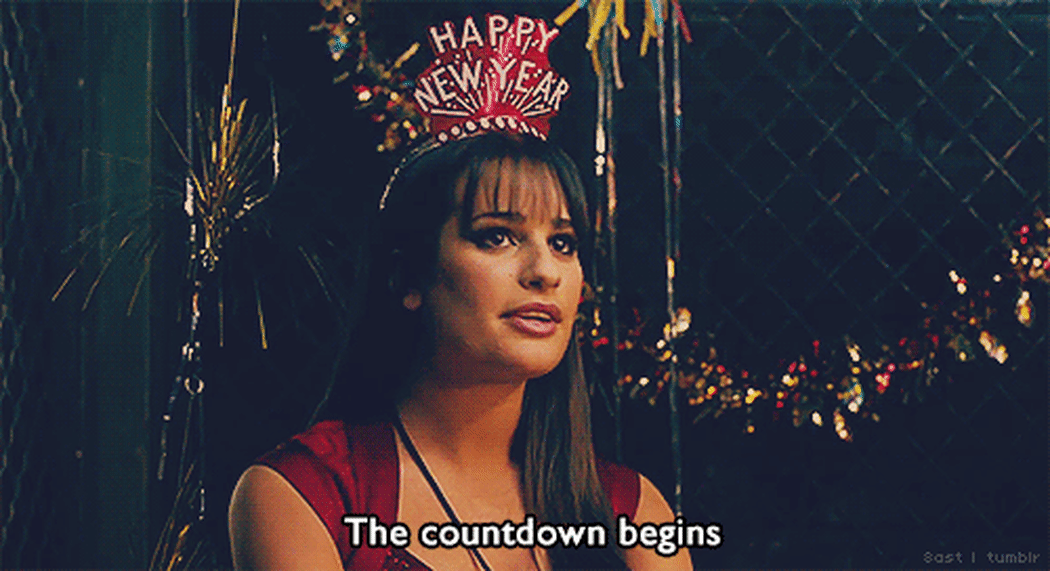 A character from Glee, wearing a Happy New Year tiara saying "the countdown begins"