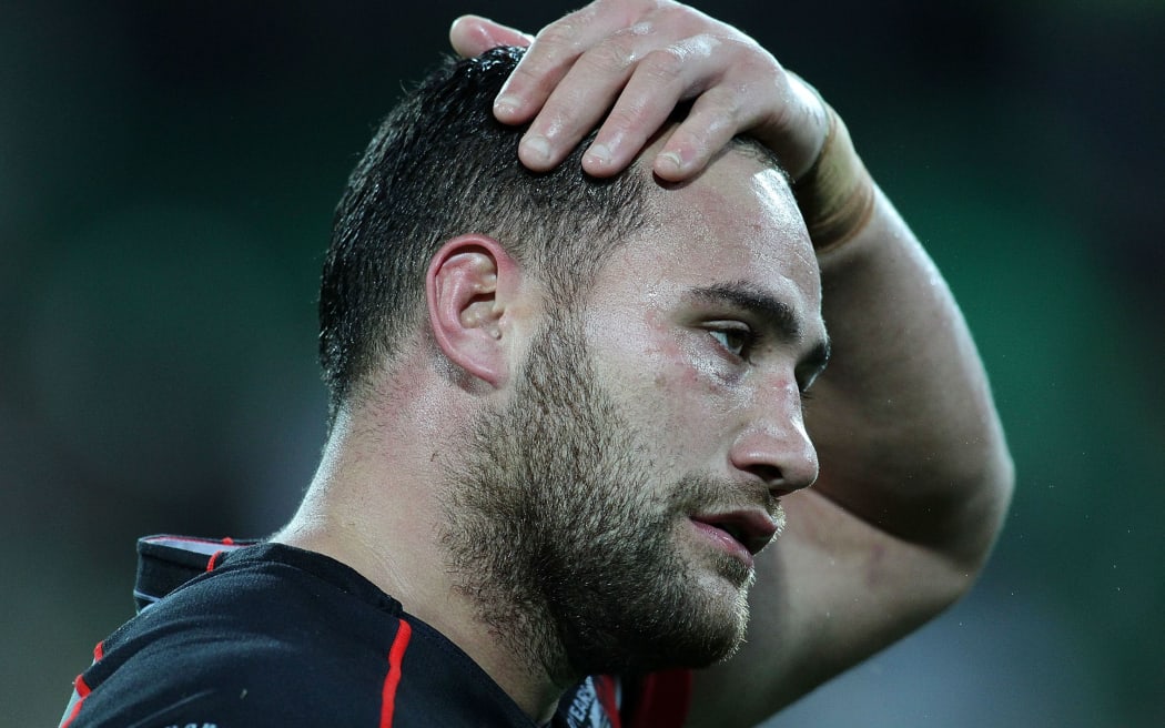 Bodene Thompson of the Warriors leaves the field dejected.