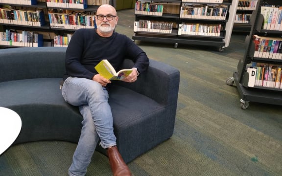 Rangiora High School principal Bruce Kearney relaxes in the school library, which has been moved into the refurbished Rakakuri building.