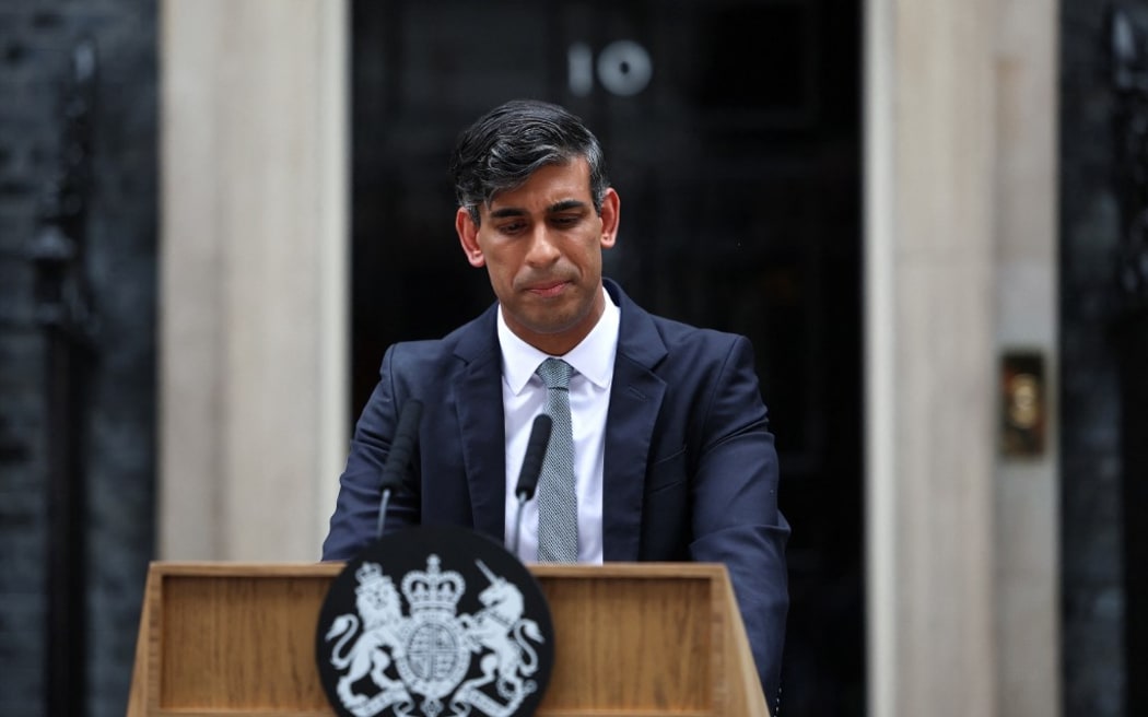 Britain's outgoing Prime Minister and leader of the Conservative party, Risihi Sunak, delivers as statement after losing the general election, outside 10 Downing Street in London on July 5, 2024, a day after Britain held a general election. British leader Rishi Sunak conceded defeat Friday to Keir Starmer's main opposition Labour party in the UK general election, saying, "I take responsibility for the loss". (Photo by HENRY NICHOLLS / AFP)