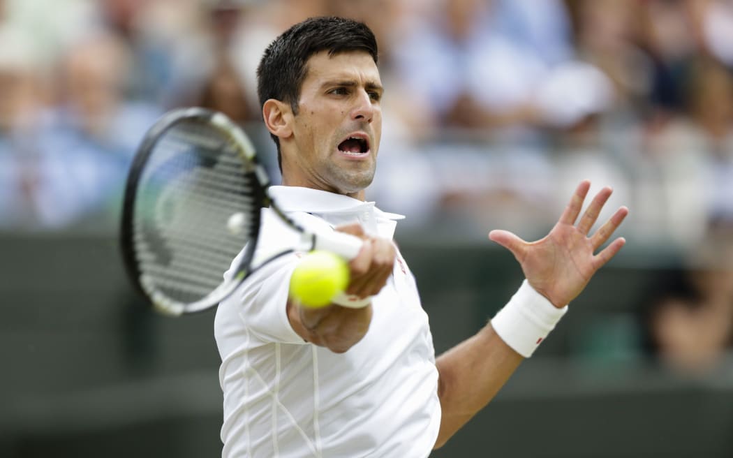 Novak Djokovic is all concentration at the All England Club