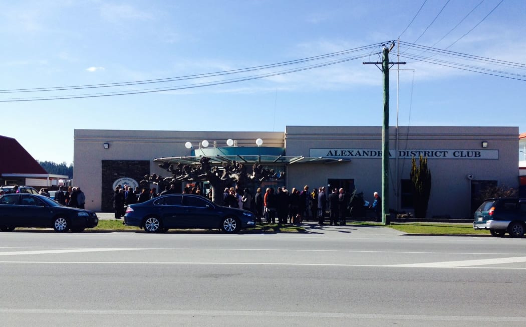 Crowds gather outside the Alexandra District Club for the funeral of Ashburton shooting victim Leigh Cleveland.