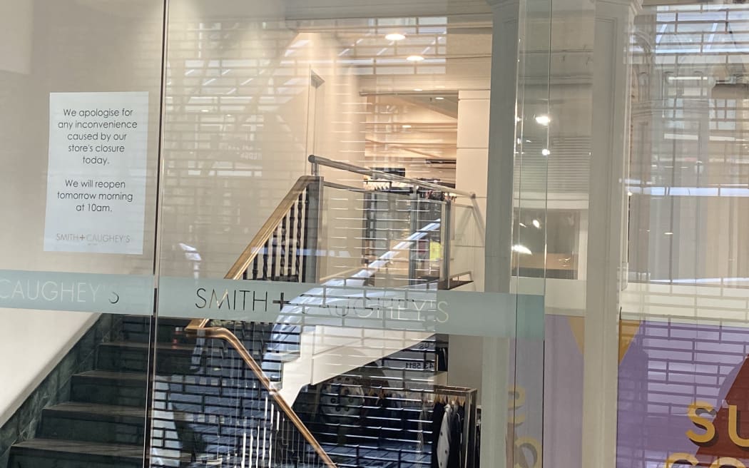 A sign apologising to customers for the closure of Smith & Caughey's on Queen Street, Auckland, on 29 May, 2024.