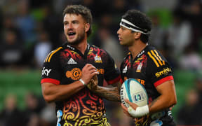 Alex Nankivell and Jonah Lowe of the Chiefs (right) celebrate with teammates after scoring a try during the Super Rugby Pacific Round 10 match between the Waikato Chiefs and the NSW Waratahs at AAMI Park in Melbourne, Friday, April 22, 2022. AAP Image/James Ross/ www.photosport.nz