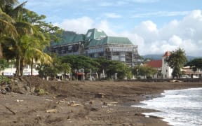 Black sand beach in Apia