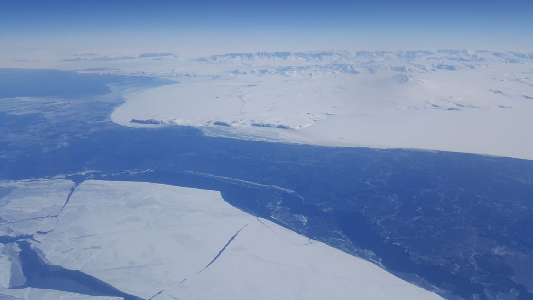 A C17 Globemaster plane has only four very small windows, but Alison Ballance managed to snap a photo of the Transantarctic Mountains on her way to Scott Base in Antarctica.